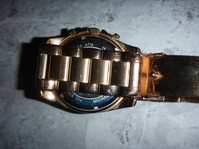 gold watch found with a metal detector