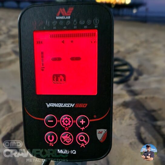 how to turn on and off the back light on a minelab vanquish